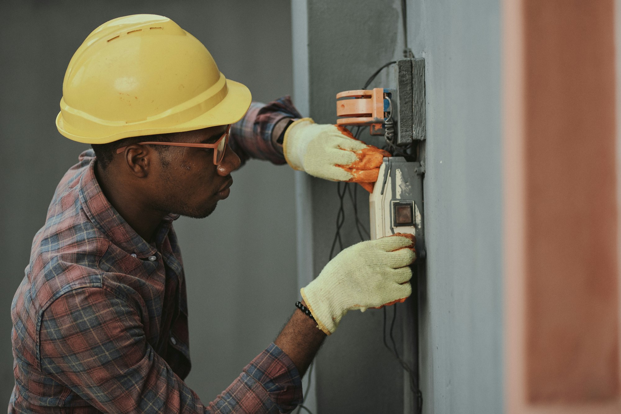 Licensed technician inspecting home heating equipment